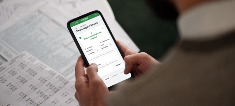 A person creating an invoice in Conta on their phone