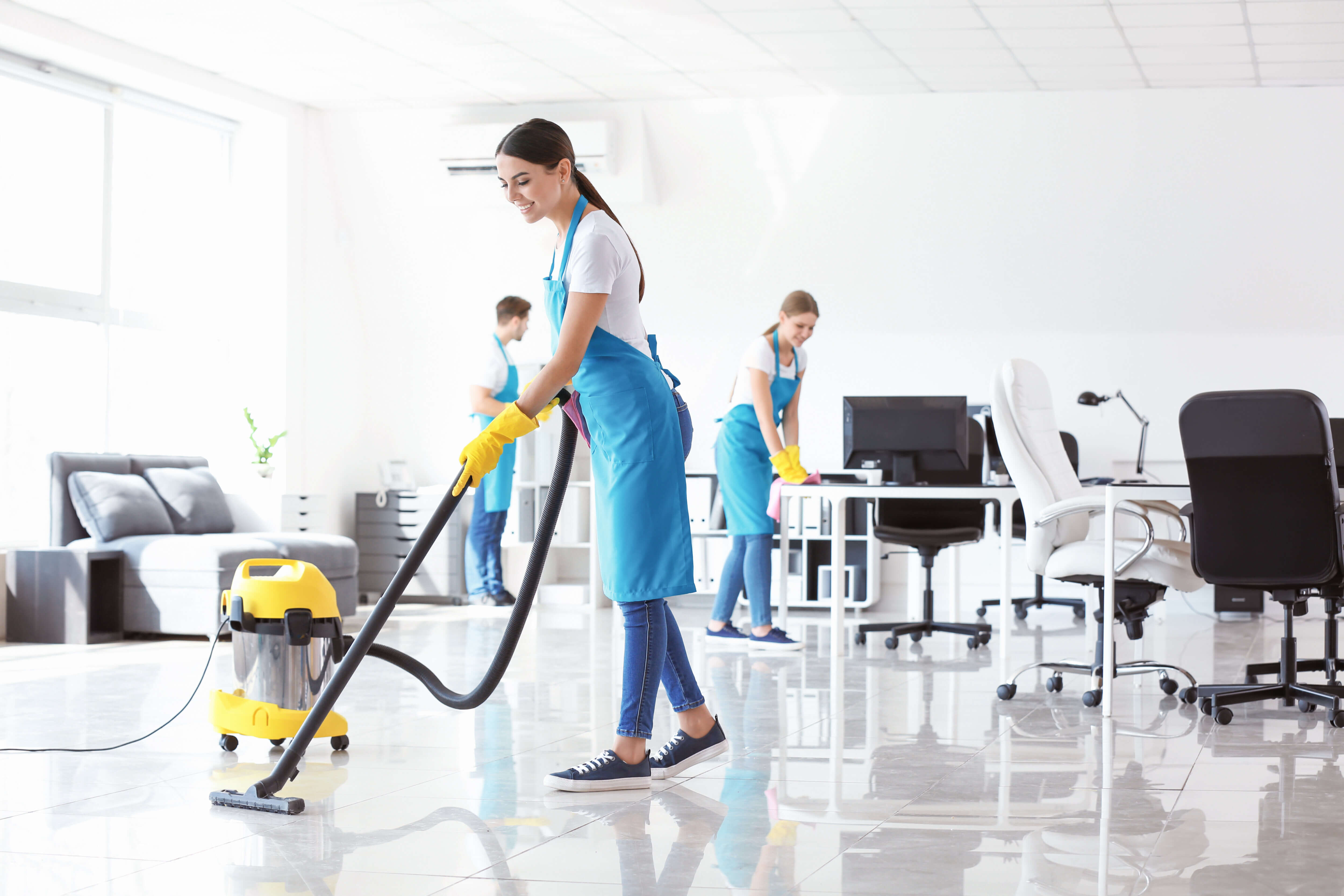 Team of business women  janitors cleaning office