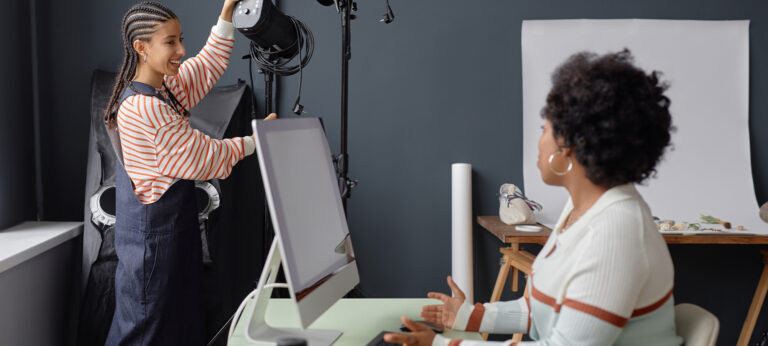 Two women in a photography studio