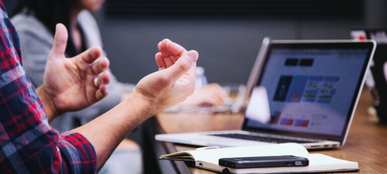 sales person hands explaining meeting with customer