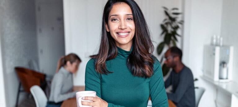 business woman coffee cup standing smiling