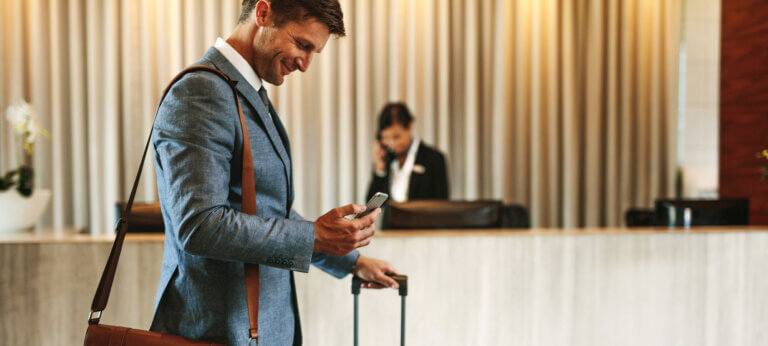 Businessman arriving at hotel lobby