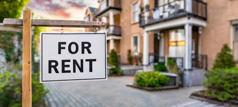 Invoicing for rental: A house with a for rent sign outside