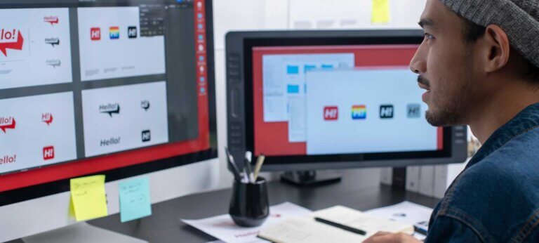 A self-employed graphic designer working on logo design