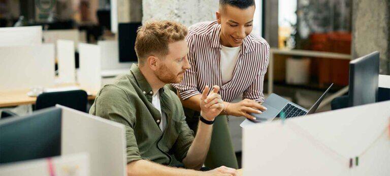 Two entrepreneurs working on a business name