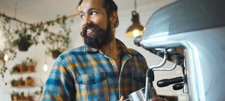 Barista running a coffee shop